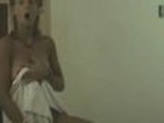 Lively chick looks so pretty after taking the shower! Her towel falls down and she stays nude previous to camera exposing perfect petite boobs!